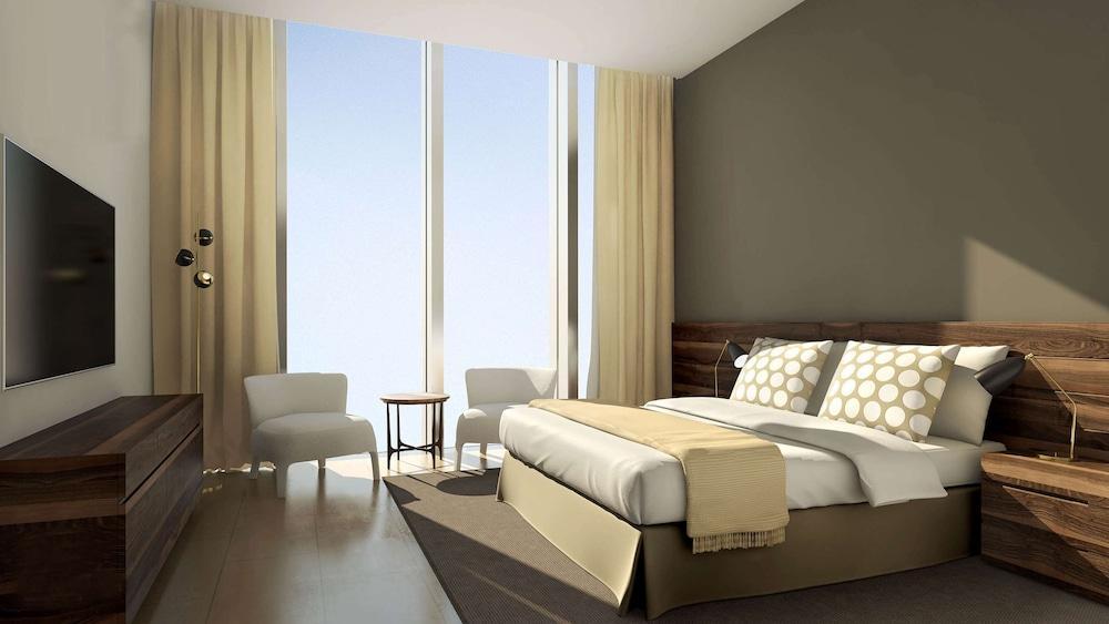 Aleph Doha Residences, Curio Collection By Hilton Εξωτερικό φωτογραφία A bedroom