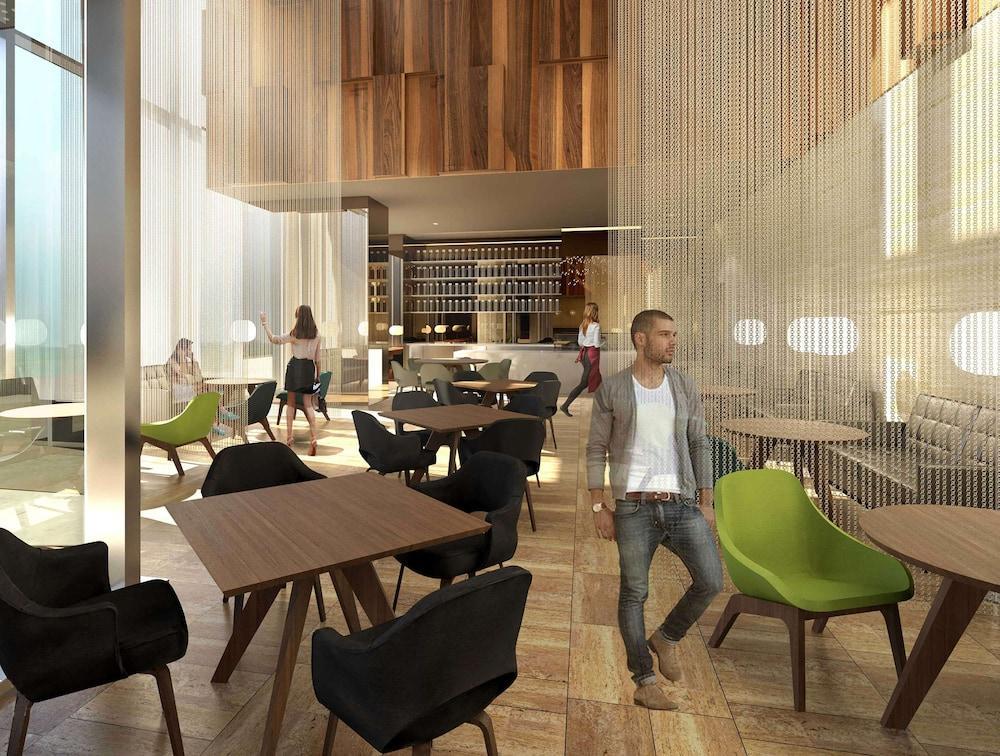 Aleph Doha Residences, Curio Collection By Hilton Εξωτερικό φωτογραφία The interior of the new restaurant