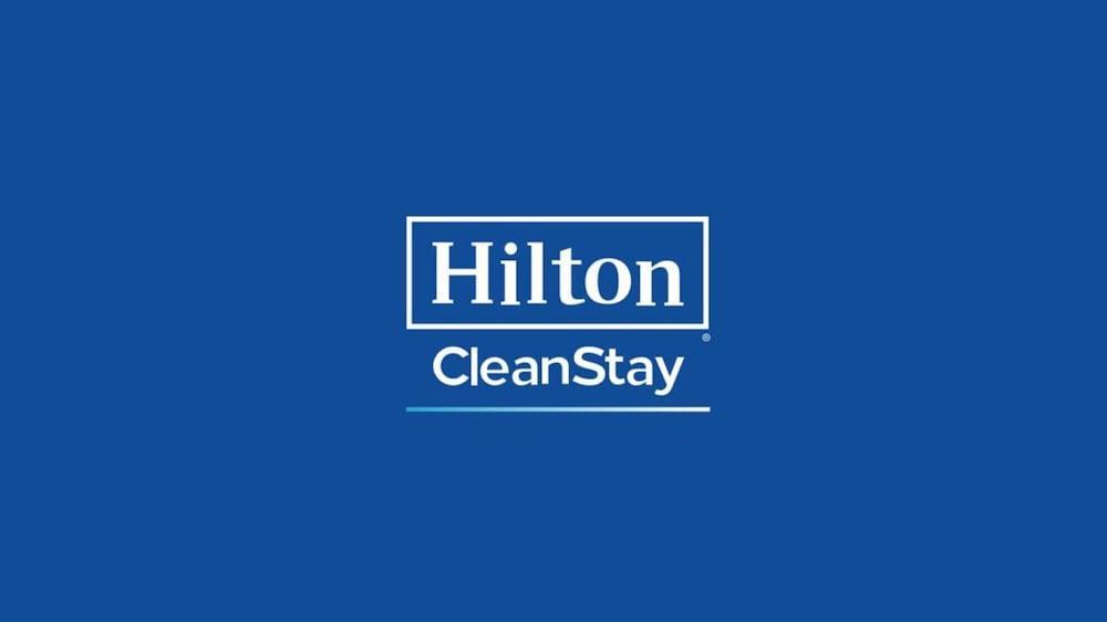 Aleph Doha Residences, Curio Collection By Hilton Εξωτερικό φωτογραφία Hilton CleanStay logo