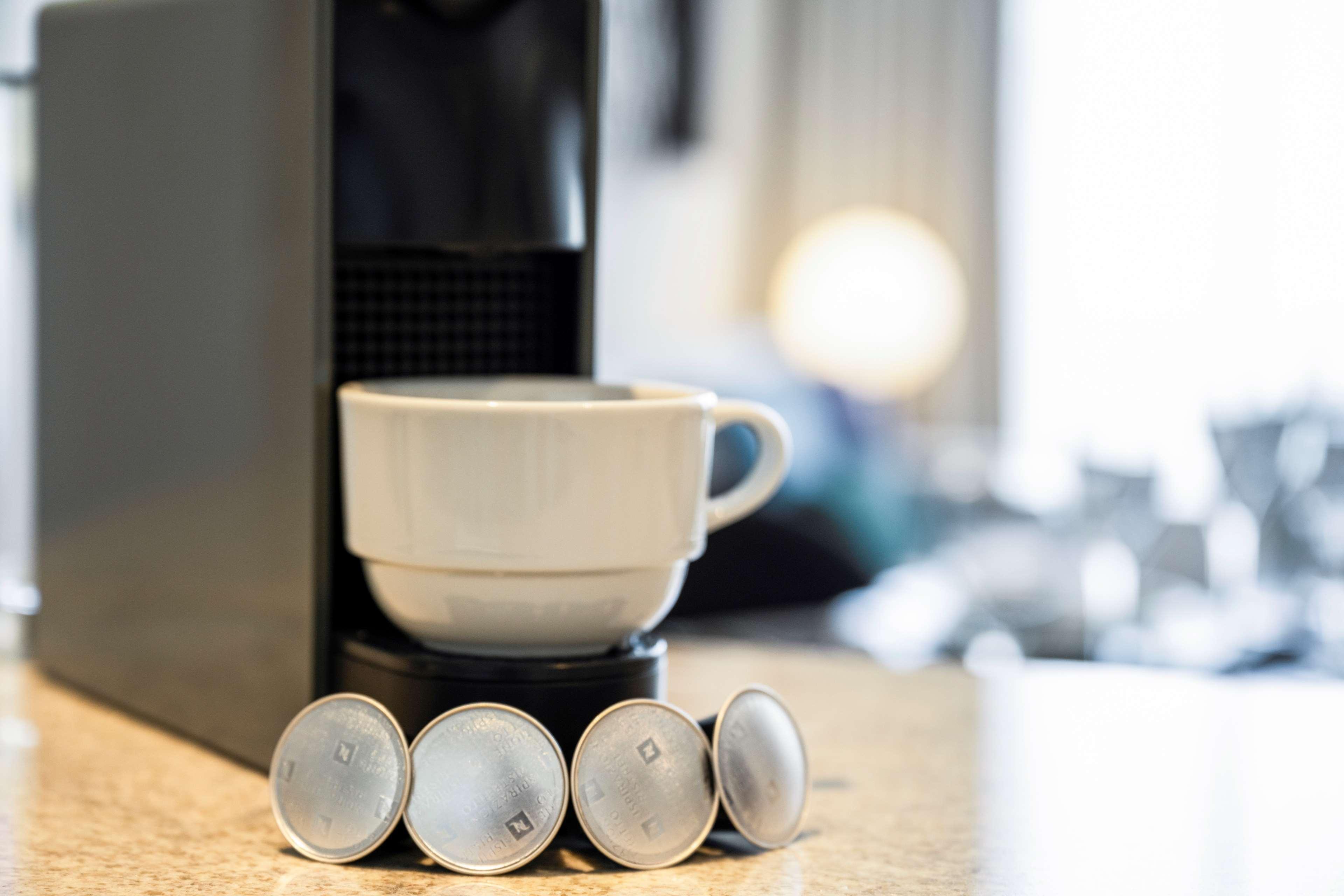 Aleph Doha Residences, Curio Collection By Hilton Εξωτερικό φωτογραφία A Nespresso machine
