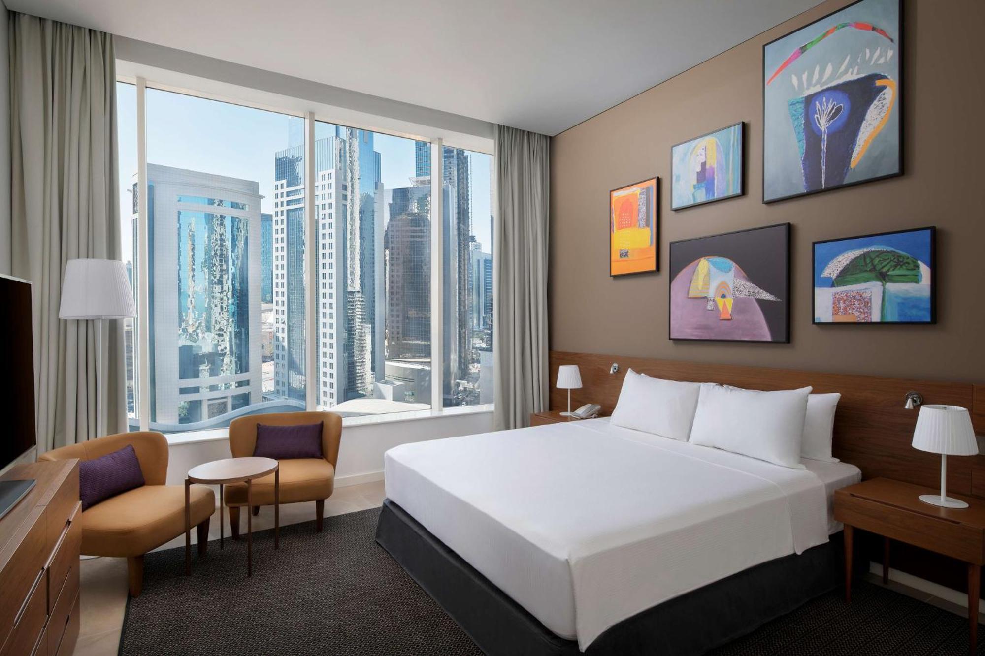 Aleph Doha Residences, Curio Collection By Hilton Εξωτερικό φωτογραφία A guest room at the hotel