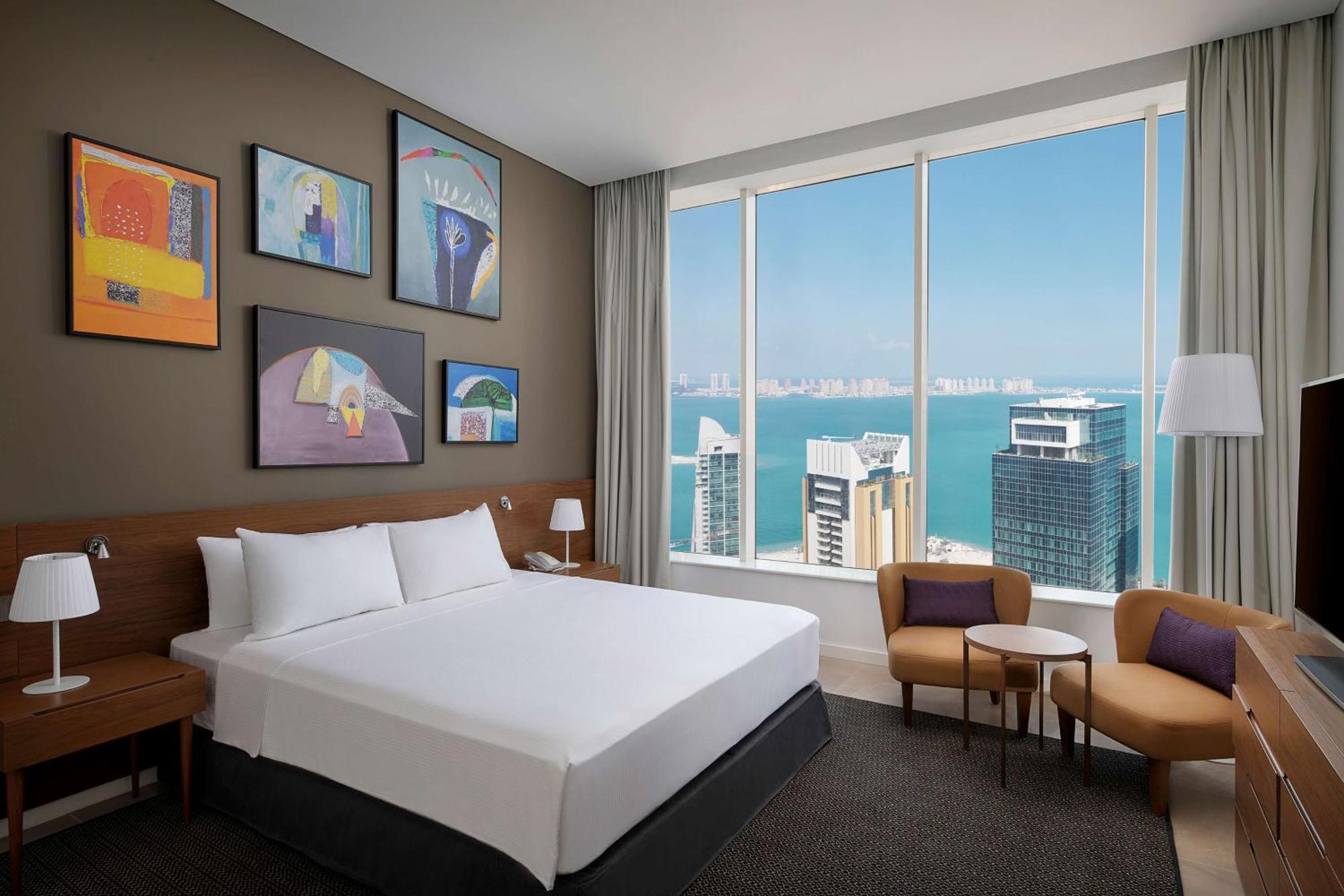 Aleph Doha Residences, Curio Collection By Hilton Εξωτερικό φωτογραφία A guest room at the hotel