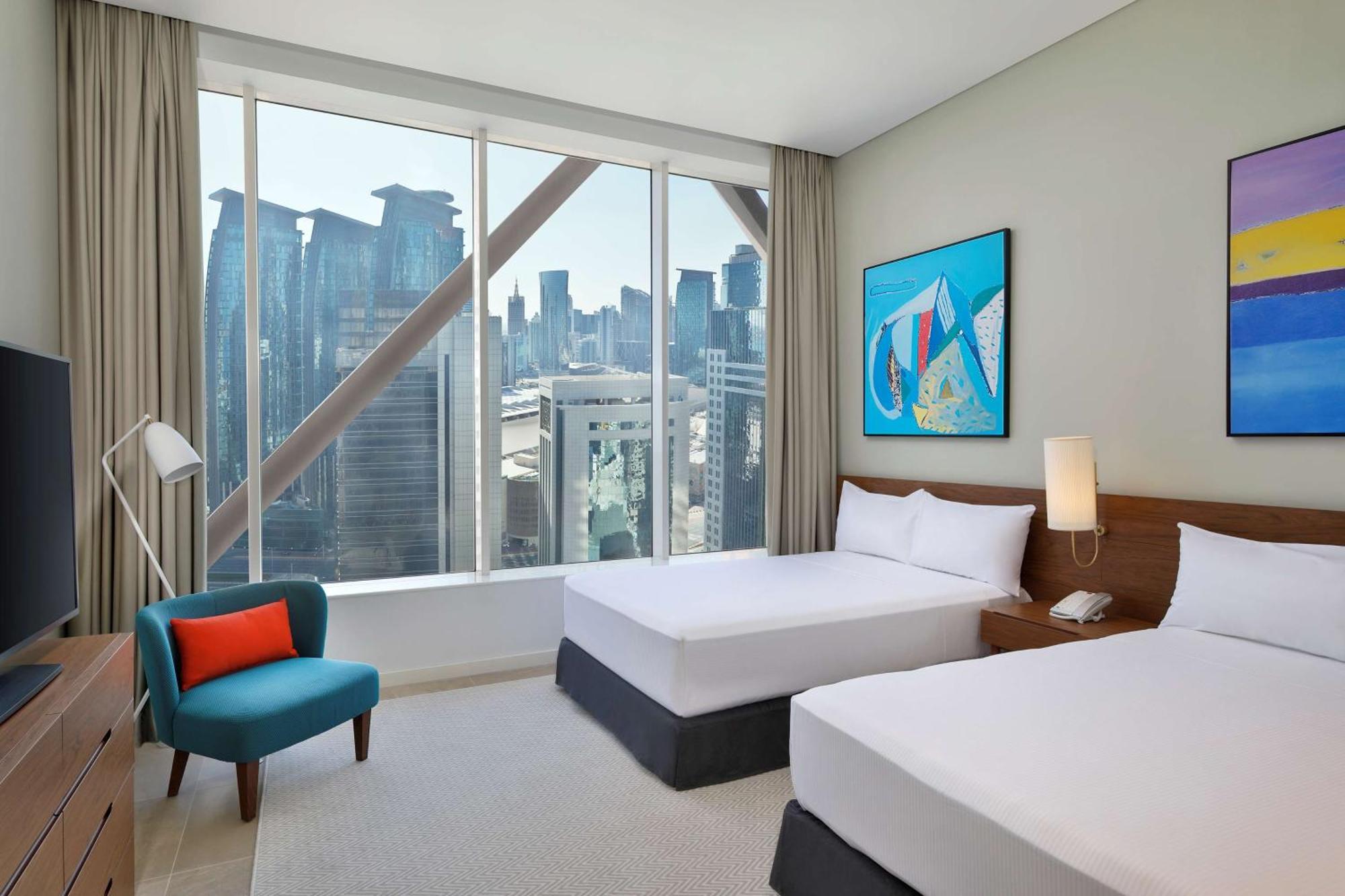 Aleph Doha Residences, Curio Collection By Hilton Εξωτερικό φωτογραφία A guest room at the hotel