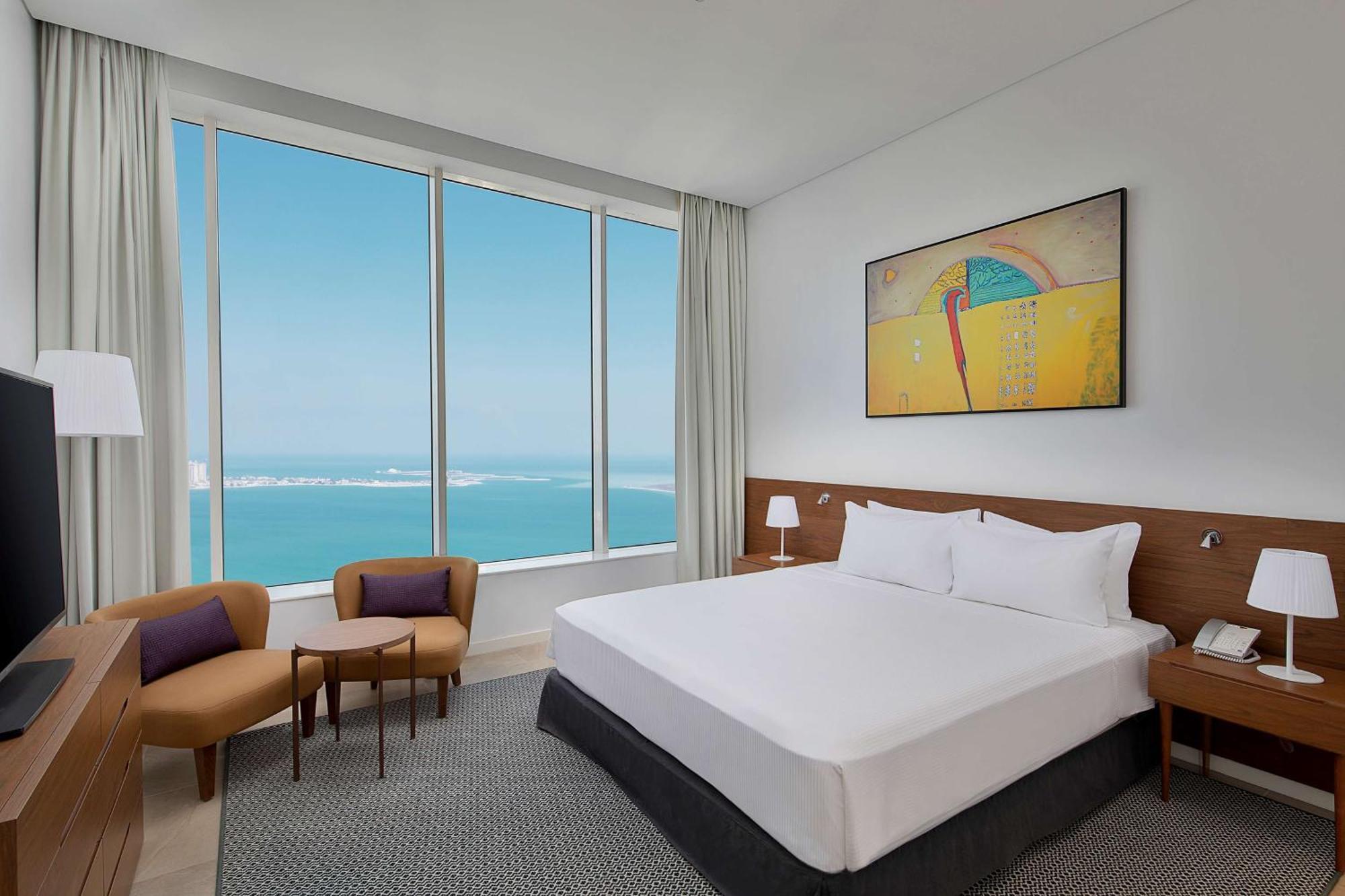 Aleph Doha Residences, Curio Collection By Hilton Εξωτερικό φωτογραφία A bedroom at the hotel