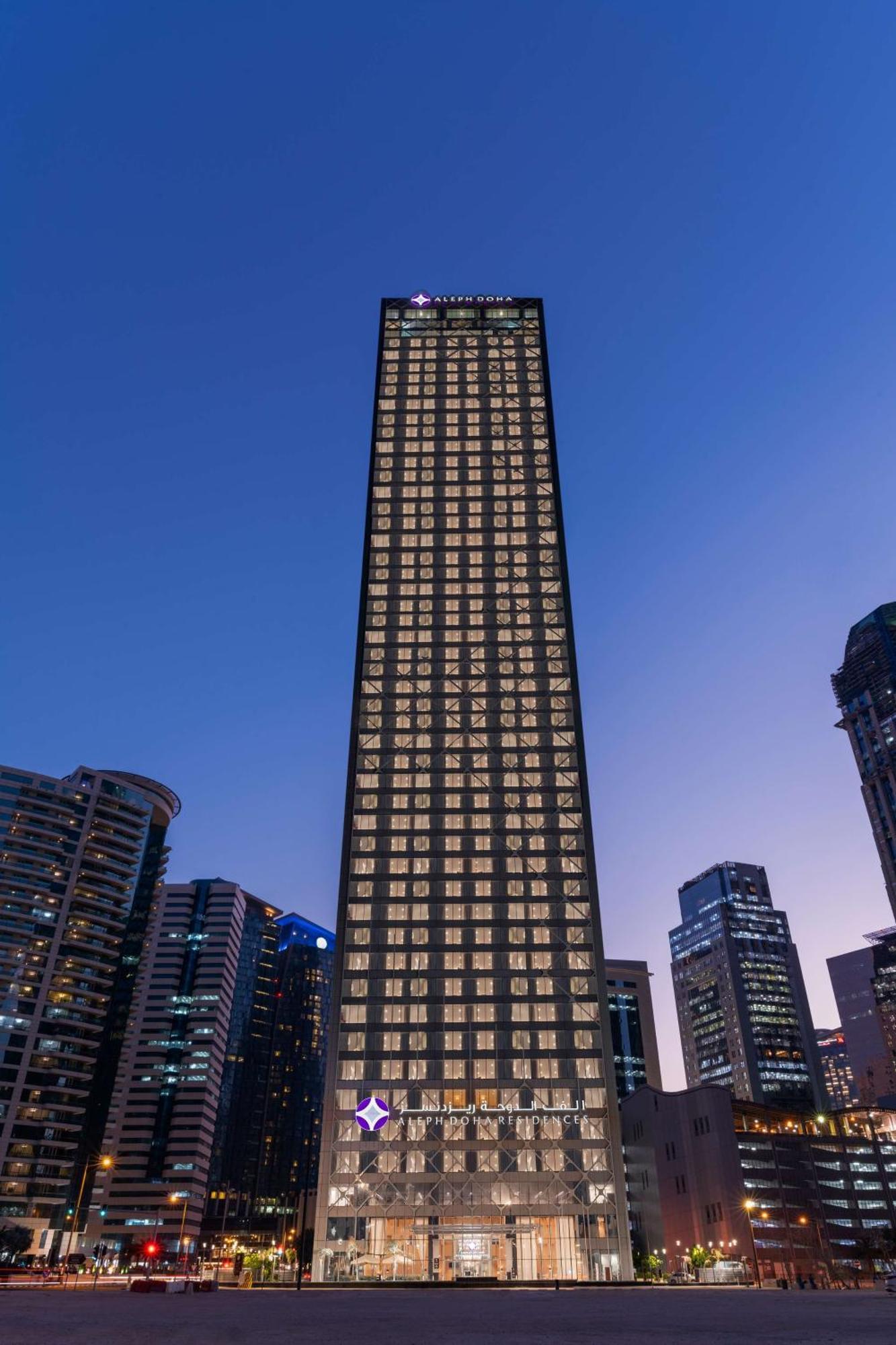 Aleph Doha Residences, Curio Collection By Hilton Εξωτερικό φωτογραφία The building at night